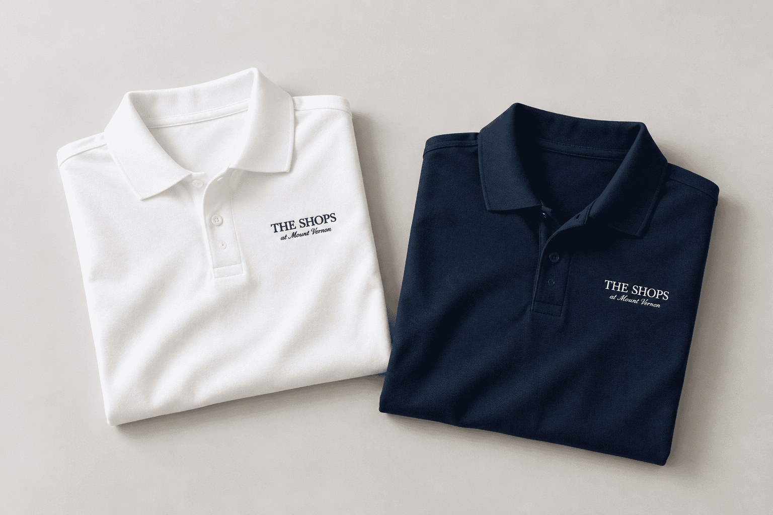 The Shops at Mount Vernon staff polos in white and navy